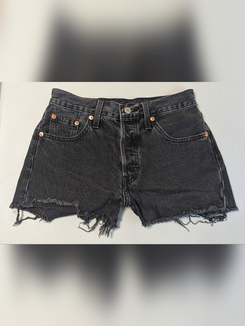 Levi's 501 black jean shorts, size 25